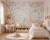 Boho nursery interior with round rug, rabbit wall mural and soft neutral color palette.jpg